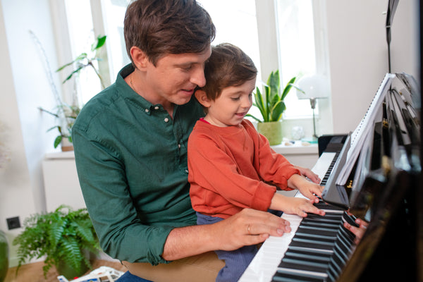 Het voordeel van piano spelen voor kinderen